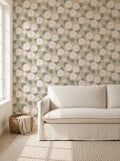 Dahlia Wheat floral wallpaper in serene living room with beige sofa.