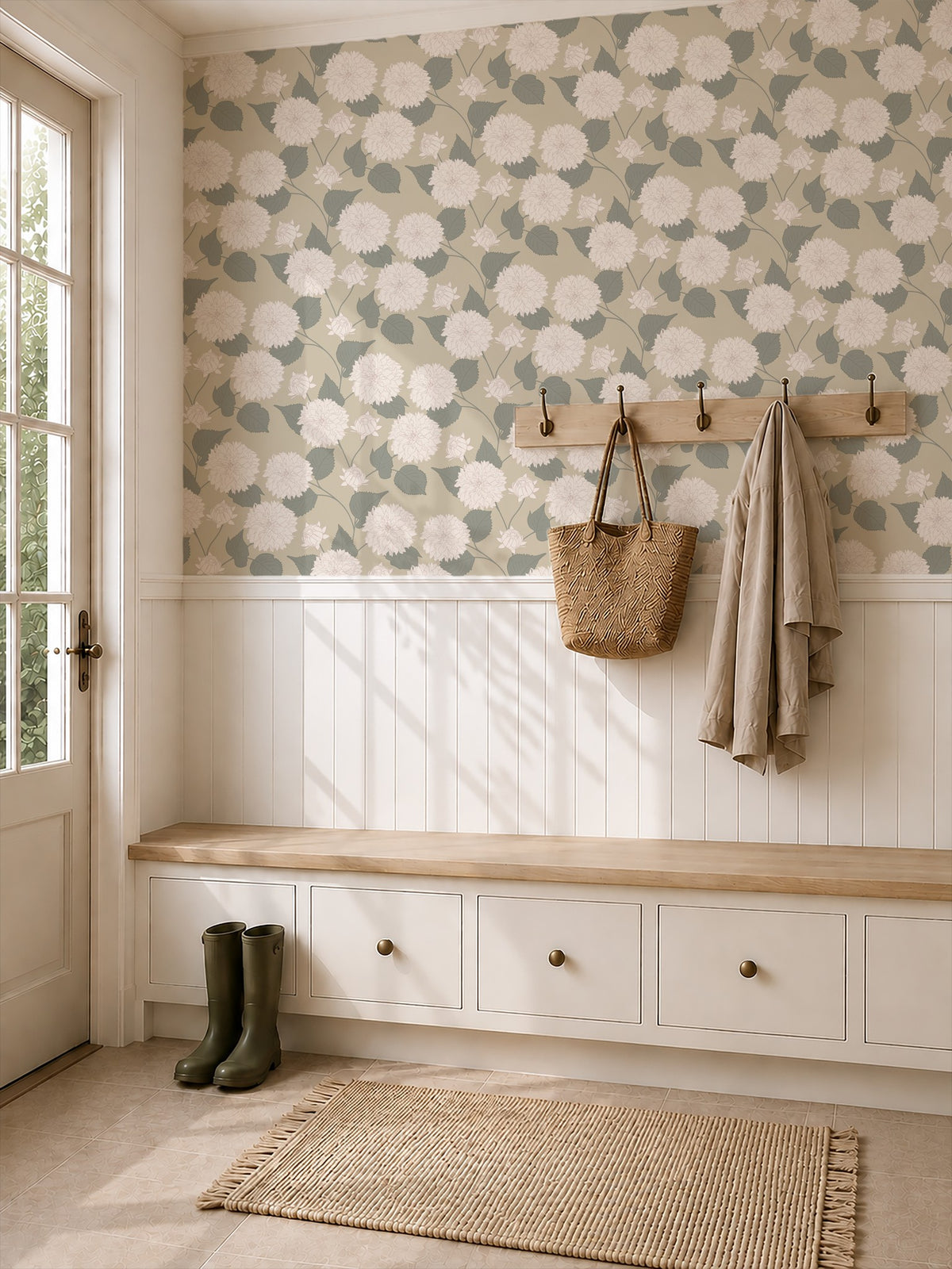 Dahlia Wheat floral wallpaper in an elegant entryway with bench and coat hooks.