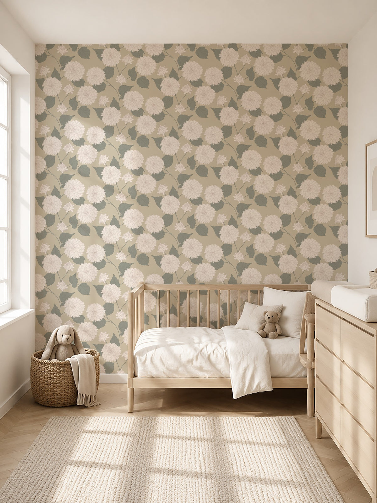 Dahlia Wheat floral wallpaper in serene nursery with crib and soft lighting.