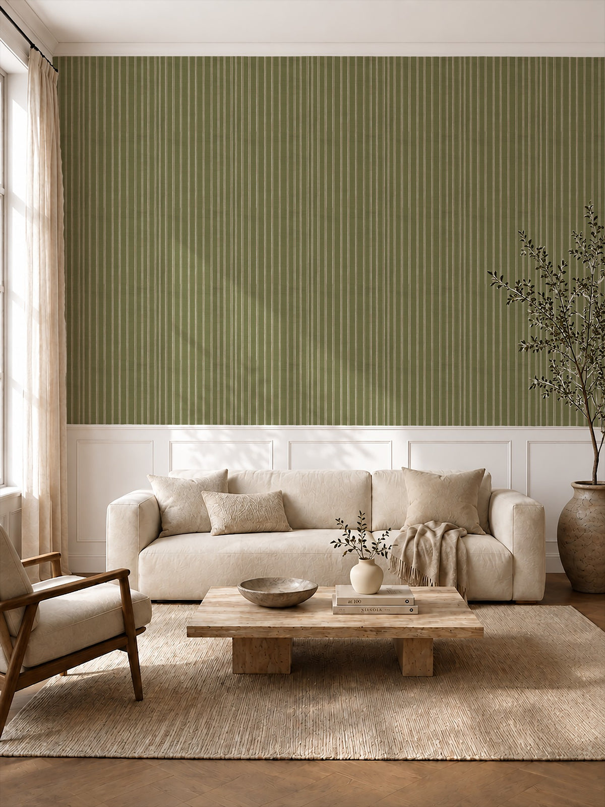 Olive green and dusty pink striped wallpaper in a cozy living room with beige sofa and wooden table.