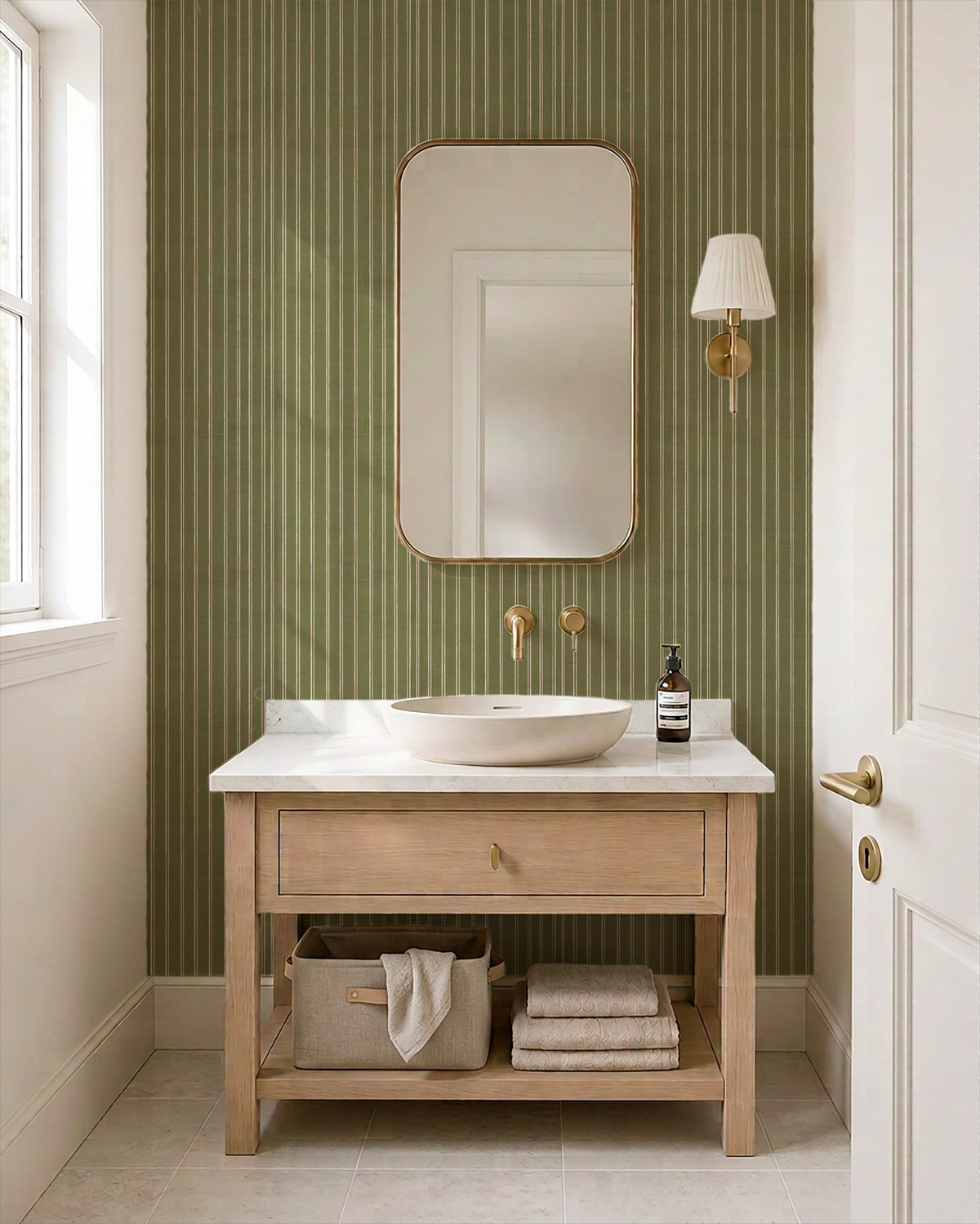 Olive and dusty pink striped wallpaper in a modern bathroom with wooden vanity.