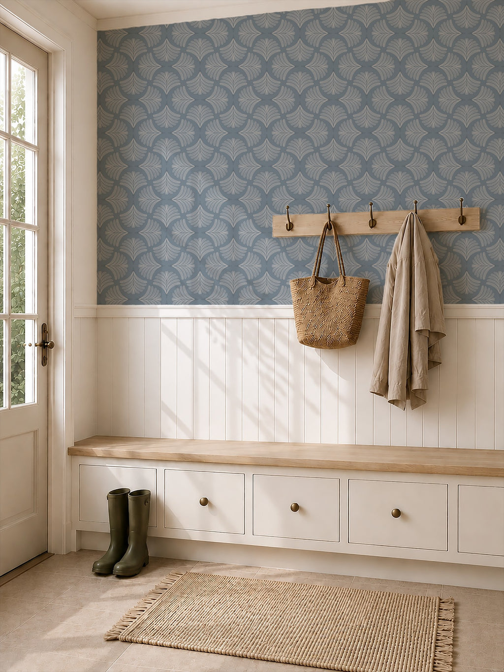 Palm Fans Moody Blue wallpaper in cozy entryway with bench and hooks.