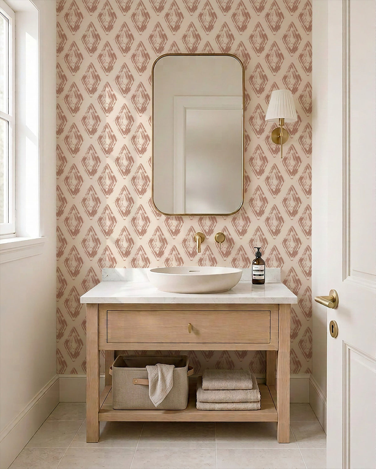 Rose clay diamond block print wallpaper in elegant bathroom with wooden vanity.