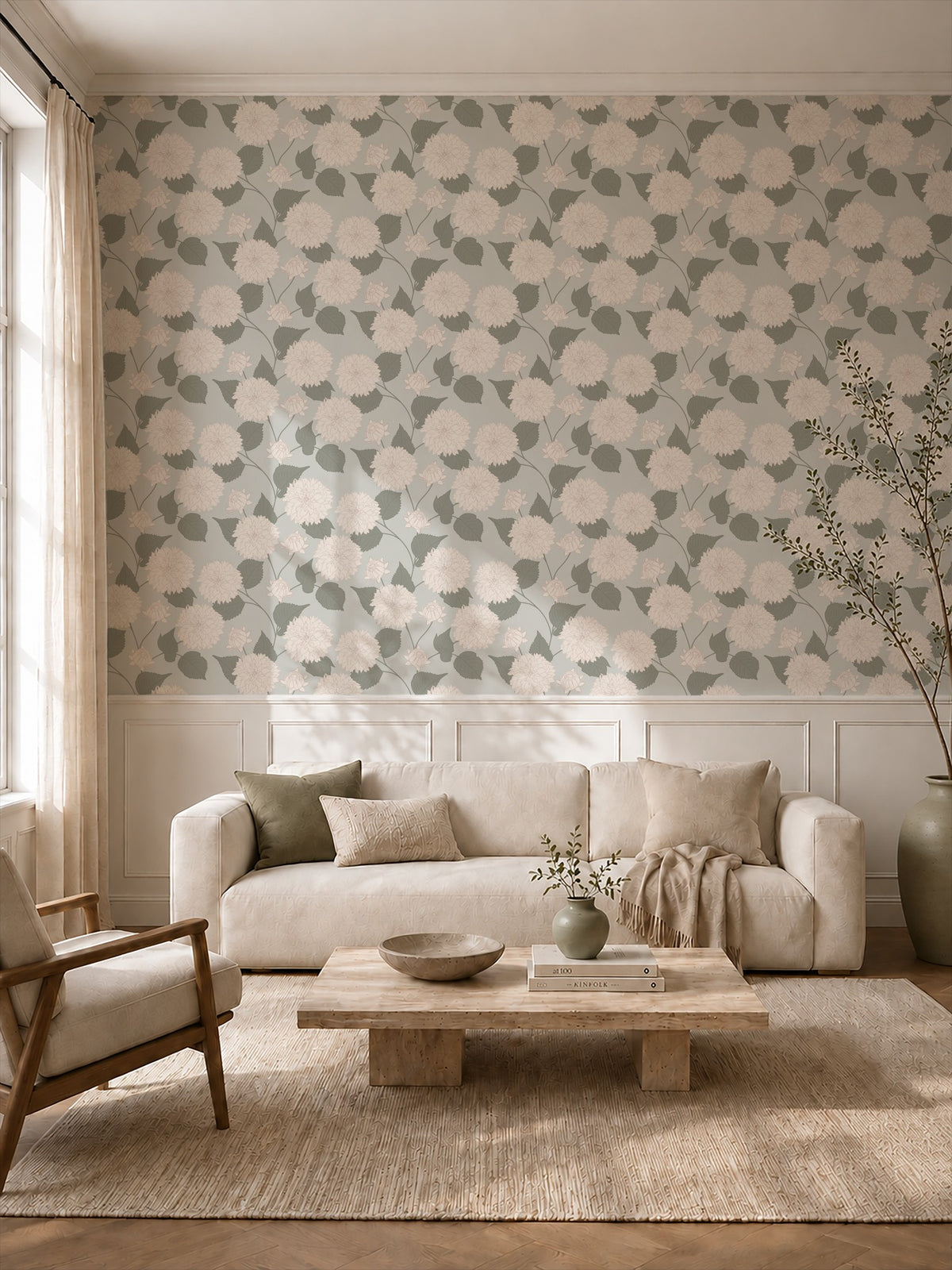 Sage and cream dahlia floral wallpaper in elegant living room with beige sofa.