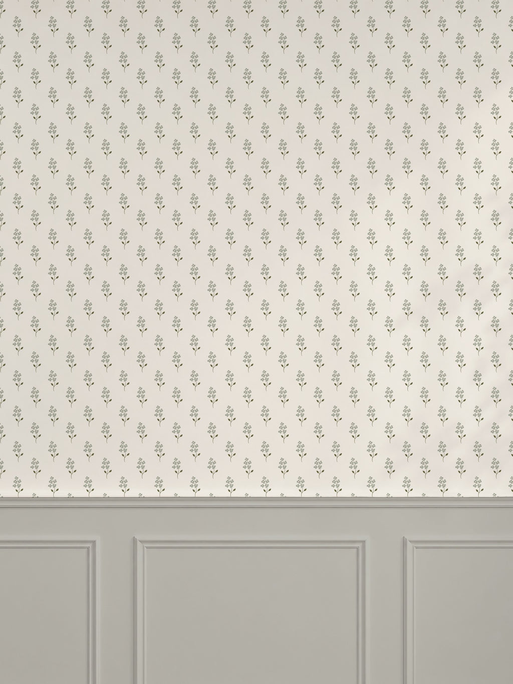 Sage green floral wallpaper with cream background in elegant room setting.