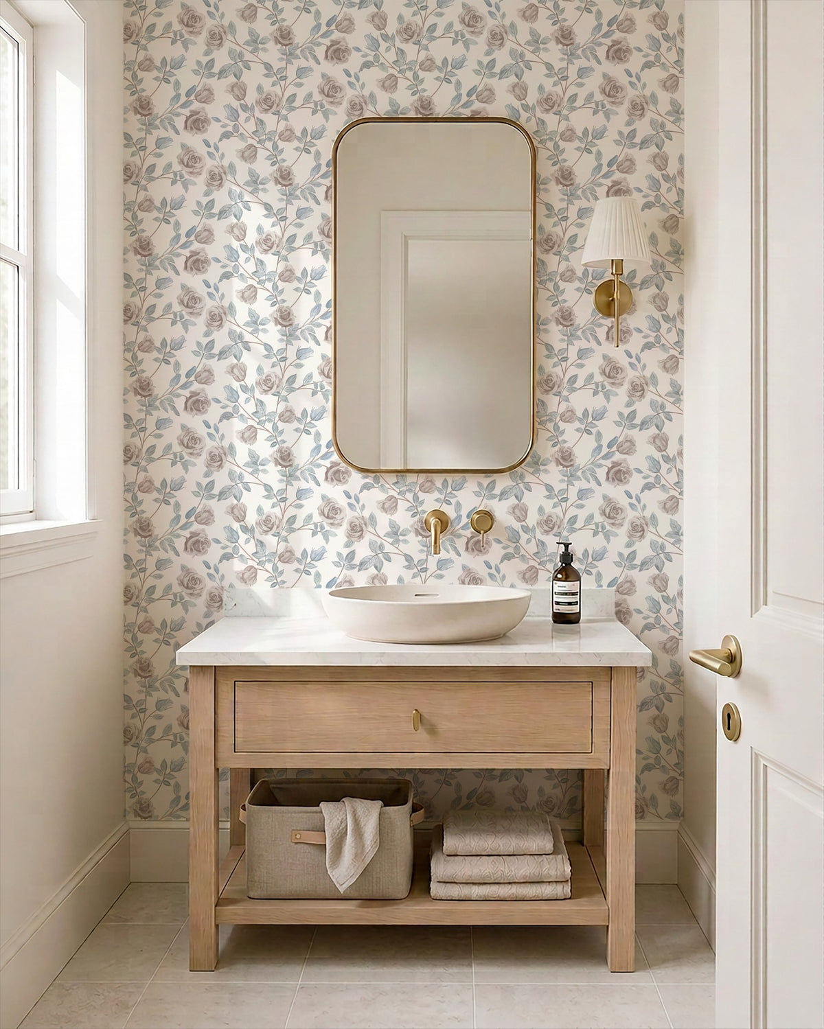 Vintage rose cream wallpaper in elegant bathroom with wooden vanity and mirror.